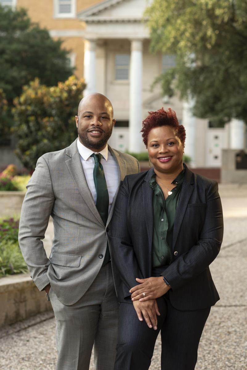 Two People in Front of UNT Building